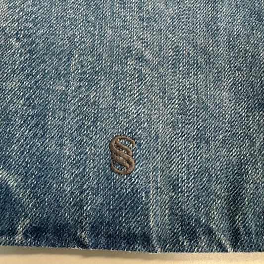 Denim swatch with brown logo